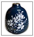 White Leschenaultia on Blue vase by Anne Blake
