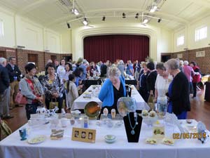 past and present members enjoying the exhibition